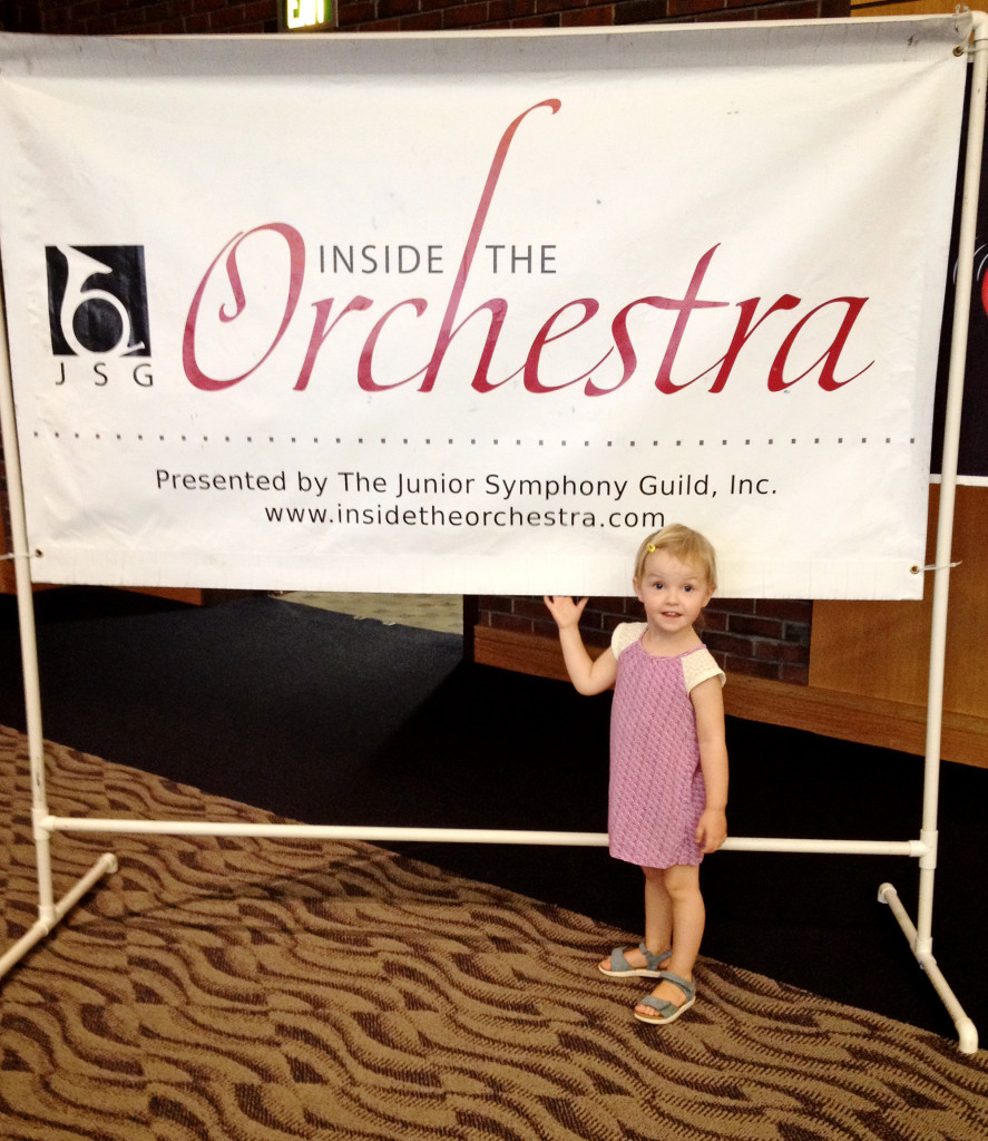 AB with the sign - she is getting so used to me saying "go stand by that (whatever thing) and smile!"